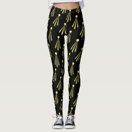 Gele zonnestralenpatroon op zwart leggings
