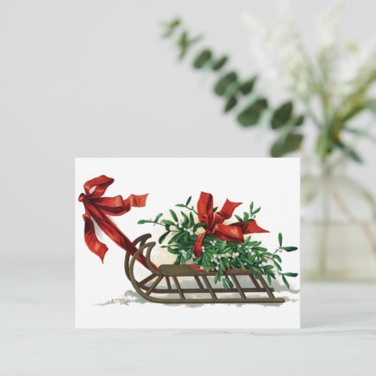 Geleid met een mistletoe in rood lintje briefkaart (Staand voorkant)