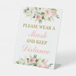 Gelieve een masker te draag reclamebord met voetstuk