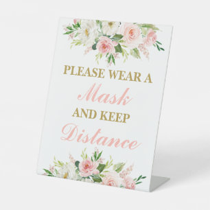 Gelieve een masker te draag reclamebord met voetstuk