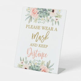 Gelieve een masker te draag reclamebord met voetstuk