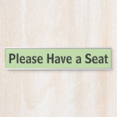 "Gelieve een stoel te hebben" Deurbordje (Voorkant)