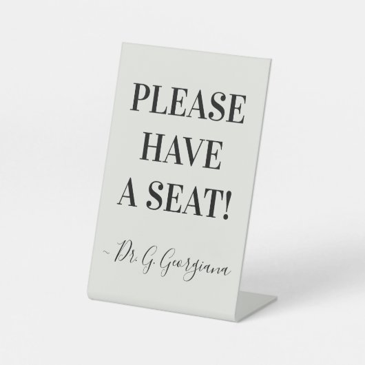 "GELIEVE EEN ZITPLAATS TE HEBBEN!" + Naam Reclamebord Met Voetstuk (Voorkant)