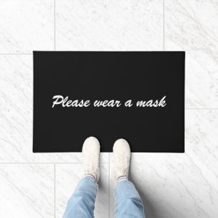 Gelieve te draag een masker zwarte elegant van het deurmat