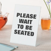 Gelieve te wachten om te zitten, restaurantteken, reclamebord met voetstuk (Insitu)