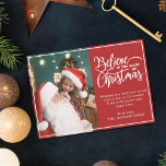Geloof in Kerstmagie 2 familiefoto's rood Feestdagenkaart<br><div class="desc">Moderne feestelijke wenskaart met een van uw favoriete kerstfamilieportretten aan de linkerkant,  aangevuld met de woorden "Geloof in de magie van Kerstmis" aan de rechterkant over een feestelijke rode achtergrond,  aanpasbaar met uw eigen wensboodschap. U kunt nog een afbeelding uploaden op de achterkant van de kaart.</div>