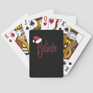 Geloof in Kerstmis met rode kerstmuts Pokerkaarten