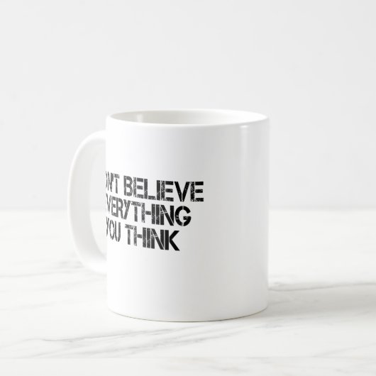Geloof niet alles wat je denkt koffiemok (Voorkant links)