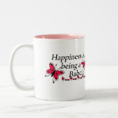 Geluk is een babyfluitje. tweekleurige koffiemok (Links)