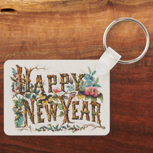 Gelukkig nieuwjaar in boomstammen, eikels en bloem sleutelhanger (Voorkant)