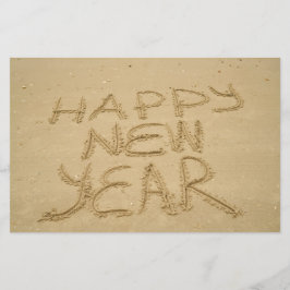 Gelukkig nieuwjaar in zand briefpapier