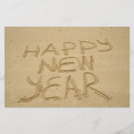Gelukkig nieuwjaar in zand briefpapier