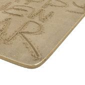 Gelukkig nieuwjaar in zand snijplank (Hoek)