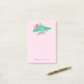 Gelukkig nieuwjaar roze en groen post-it® notes (Op bureau)