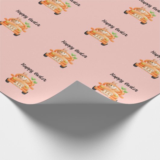 Gelukkig paasbroodje op roze cadeaupapier (Hoek)