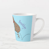 Gelukkig springkiwi met het ontwerp van de cartoon latte mok (Rechts)