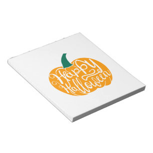 Gelukkige Halloween-belettering op gesneden pompoe Notitieblok