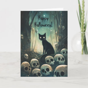 Gelukkige Halloween kat tussen schedels Bedankkaart