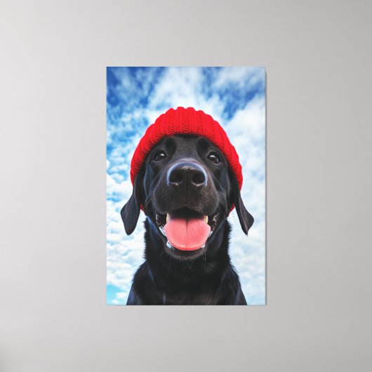 Gelukkige Labrador in een rode muts onder een blau Canvas Afdruk (Voorkant)