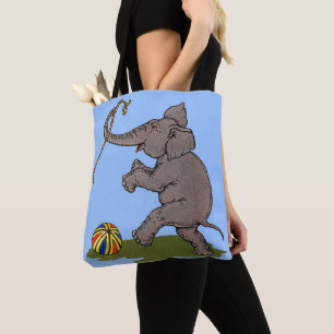 gelukkige olifant die met touw en bal speelt tote bag