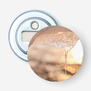 gemagnetiseerde flessenopener, foto zon van het button flesopener