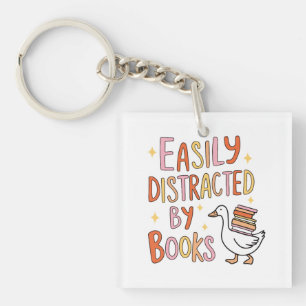Gemakkelijk afgeleid door boeken sleutelhanger