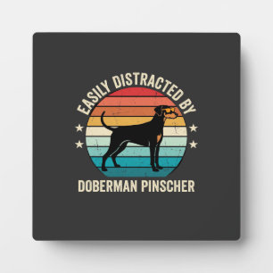 Gemakkelijk afgeleid door Dobermannpinscher Retro Fotoplaat