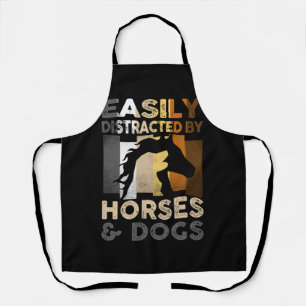Gemakkelijk afgeleid door paarden en honden vind i schort