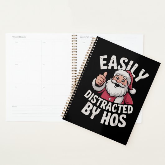 Gemakkelijk afgeleid door zijn grappige kerstfeest planner (Display)