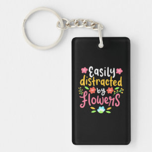 Gemakkelijk verstoord door bloemen sleutelhanger