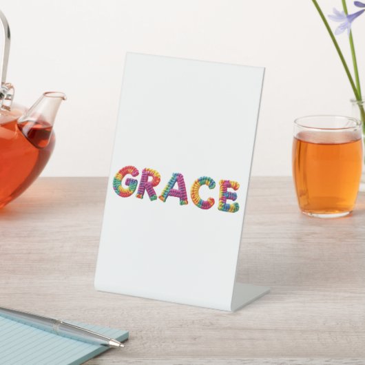 Genade Naam in Levendig Haakpatroon Reclamebord Met Voetstuk (Insitu)