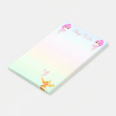 Genieën en magische lamp op pastelkleuren post-it® notes (Schuin)