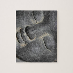 Gentle Buddha Face Stone Sculpture Legpuzzel