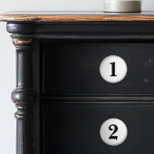 Genummerde zwarte en witte keramische knoppen