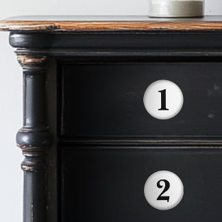 Genummerde zwarte en witte keramische knoppen