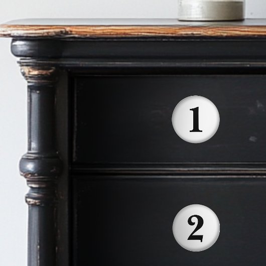 Genummerde zwarte en witte keramische knoppen