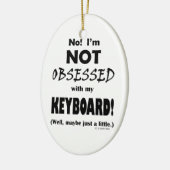 Geobsedeerd toetsenbord keramisch ornament (Links)