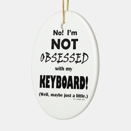 Geobsedeerd toetsenbord keramisch ornament (Links)