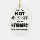 Geobsedeerd toetsenbord keramisch ornament (Voorkant)