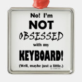 Geobsedeerd toetsenbord metalen ornament (Voorkant)