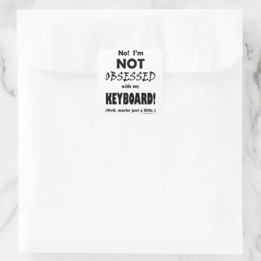Geobsedeerd toetsenbord vierkante sticker (Tas)
