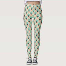 Geometric pattern of teal, beige, and black shapes leggings