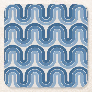 Geometrisch golfontwerp in blauw kartonnen onderzetters