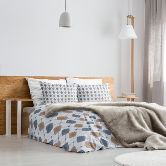 Geometrisch mannelijk patroon in blauw en beige kussensloop