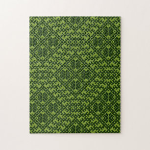 Geometrisch noords patroon in groen legpuzzel