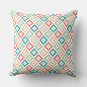 Geometrisch ontwerp in koraal en turquoise kussen