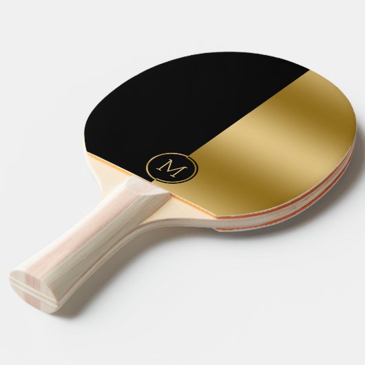 Geometrisch ontwerp met zwart en goud splitscreen tafeltennisbatje (Voorkant Gekanteld)