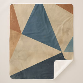 Geometrisch patroon in blauw, taupe en roest sherpa deken