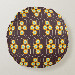 Geometrisch patroon met oranje en blauwe zeshoeken rond kussen