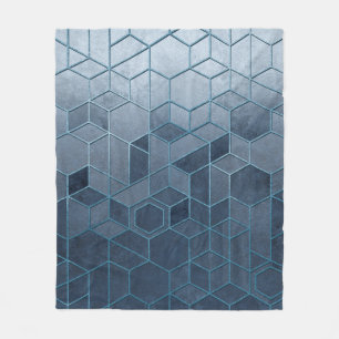 Geometrische abstractie van zeshoeken op een blauw fleece deken
